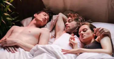 MMF threesome in bed, cuddling